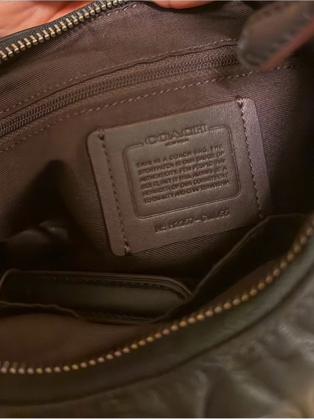 Coach black embossed